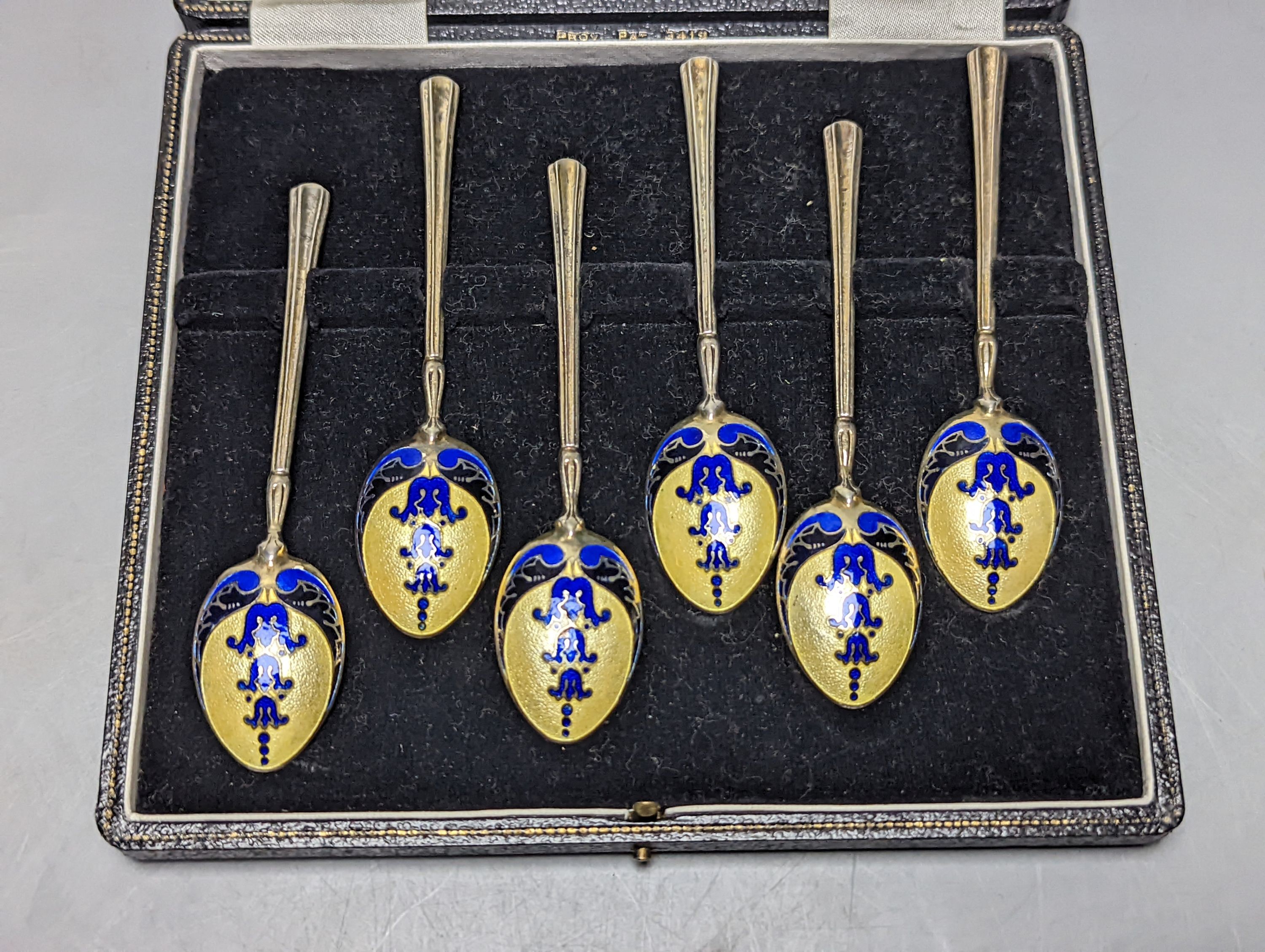 A cased set of six silver and three colour enamelled coffee spoons, Turner & Simpson, Birmingham, 1952/53.